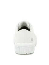 Sneakers de lona blanca para mujer con plataforma, cordones y suela dentada. Cuentan con el logo de la marca en plateado en el lateral.