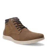 Botas de caña media Freeway, confeccionadas en cuero nobuk color marrón miel, con cierre de cordones, cuello acolchado en tono oscuro y suela de goma en color crema.