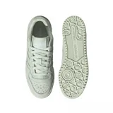 Championes Adidas Forum Bold, color verde claro, con plataforma y detalles perforados.