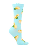 Medias de largo medio en color celeste con estampado de limones y hojas. Cuentan con un puño superior con terminación festoneada.