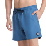 Short de baño Volcom Lido Solid Trunk 16 de color azul, con cintura elástica con cordón de ajuste negro y bolsillos laterales. Presenta un parche redondo con el logo de la marca en la pierna izquierda.