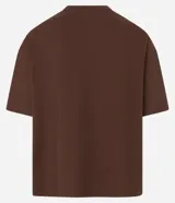 Remera de algodón con cuello redondo y mangas cortas, de corte overboxy holgado y diseño liso.