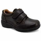 Zapato casual de cuero color marrón oscuro, con cierre de doble velcro y suela de goma negra.