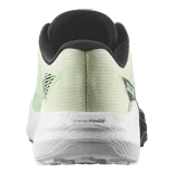 Championes de trail running Salomon Pulsar, color verde menta con entresuela combinada en blanco y negro, y cordones de ajuste rápido.
