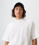 Remera boxy de algodón color negro, con cuello mock neck y mangas cortas, marca Blue Steel.