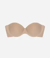 Soutien tipo top color nude, con copas moldeadas y borde festoneado en la parte superior. Posee tirantes finos removibles.