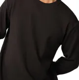 Remera Rip Curl de manga larga y textura tipo waffle, color negro, con cuello redondo y diseño de corte clásico.