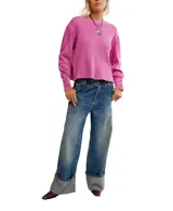 Buzo de calce relajado con escote a la base, hombros caídos y mangas amplias con detalle de ojalillos y cordones en los puños. Confeccionado en tejido de algodón con textura tipo waffle.