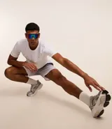 Bermuda deportiva masculina, color verde azulado con efecto degradé, cintura elástica con cordón de ajuste interno y forro de tela.