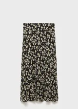 Falda midi de gasa color negro con estampado de pequeñas flores blancas.