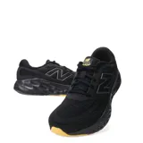 Championes New Balance Evoz V4 para hombre, color negro con suela color caramelo.