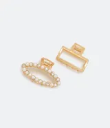 Set de dos pinzas para el cabello doradas: una con forma rectangular y otra con forma ovalada decorada con perlas y strass.