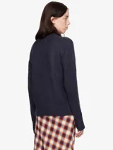 Sweater azul marino de mohair con cuello redondo y corte holgado.
