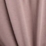 Remera manga corta color marrón claro con logo de New Balance estampado en el pecho.