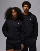 Buzo hoodie negro de la marca Nike Jordan, con logo Jumpman bordado en blanco en el pecho y bolsillo tipo canguro.