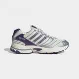 Championes Adidas Adistar Control 3 de running, color blanco con detalles plateados y violetas. Cuentan con exterior de malla y refuerzos sintéticos, estructura de TPU y suela de caucho.