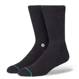 Par de medias negras de caña media con logo de la marca en el tobillo y puntera en color celeste.