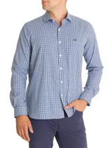 Camisa de manga larga de algodón y lana, modelo Wool de RKF, con diseño a cuadros en tonos azul marino, blanco y negro. Cuenta con cuello italiano, cierre frontal con botones y un bolsillo en el pecho con el logo bordado.