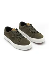 Championes urbanos de lona color negro con costuras blancas contrastantes, suela de goma blanca y cordones negros. Presenta una pequeña etiqueta con logo en el lateral.