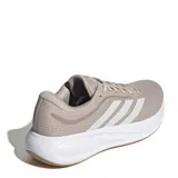Championes de running Adidas Response Runner 2, color beige con detalles en blanco. Presentan un diseño de malla transpirable, las icónicas tres bandas laterales y una suela con amortiguación.