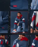 Canguro de felpa azul jean gastado con capucha roja y tiras blancas y rojas en las mangas. Diseño original de autor, corte holgado.