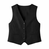 Chaleco sastrero negro con escote en V, cierre frontal de cuatro botones y bolsillos laterales simulados.