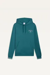 Canguro Puma modelo Class Graphic Hoodie, color crudo con capucha y bolsillo tipo canguro. Presenta un estampado en la espalda con el logo de la marca y la inscripción "Puma Athletics Since 1948".