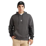 Canguro Quiksilver de corte oversized, confeccionado en tejido terry francés color gris. Presenta capucha con cordón ajustable, bolsillo frontal tipo canguro, mangas largas con puños en punto canalé y detalle de bloques de color en contraste. Incluye una pequeña insignia de la marca bordada en el centro del pecho.
