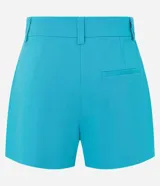 Short pollera corto de bengalina color turquesa, con trabillas en la cintura, diseño cruzado y bajo asimétrico.