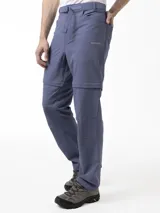 Pantalón Merrell desmontable de trekking color gris, de corte recto y tiro medio, confeccionado con tejido elástico de poliéster y spandex. Incluye cinturón ajustable, bolsillos laterales con cierre y logo reflectante.