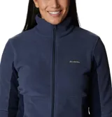 Campera polar de mujer con cierre completo frontal, cuello alto y bolsillos laterales. Presenta un diseño entallado con paneles laterales en un tono de azul más oscuro y el logo de la marca bordado en el pecho.
