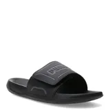 Sandalias Puma modelo Royalcat Comfort 2, color negro con detalles en gris. Presentan una banda superior ajustable con el logo de la marca en relieve y una plantilla ergonómica diseñada para mayor comodidad.