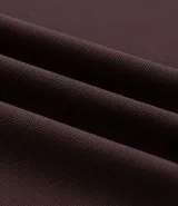 Remera polo deportiva de hombre marca Get Over, color marrón, confeccionada en tejido tecnológico de poliamida con tecnología dry y acabado liviano. Cuenta con cuello polo, cartera de botones y mangas cortas.