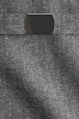 Pollera mini de tiro alto en color gris jaspeado, con diseño estructurado y cinturón extraíble con hebilla metálica rectangular.