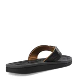 Sandalias tipo ojota para hombre, con diseño ergonómico y plantilla anatómica. Presentan tiras anchas de material sintético con textura y detalle de logo circular en el lateral.