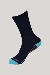 Media deportiva de caña media, color azul marino con puntera y talón en color turquesa. Presenta detalles de agarre antideslizante en la planta del pie y logo de la marca en la puntera.