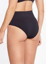 Bombacha modeladora de tiro alto confeccionada en microfibra de poliamida, con faja de licra en la cintura para mayor contención y diseño sin costuras.