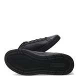 Championes Puma Court Classico de color negro, con diseño urbano de inspiración deportiva, capellada sintética, cordones negros y detalles de la marca en dorado.