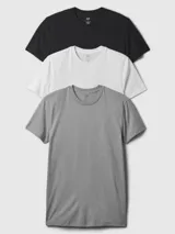 Pack de tres camisetas de cuello redondo y manga corta marca Gap, confeccionadas en algodón. El set incluye una camiseta negra, una blanca y una gris.