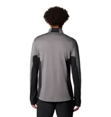Remera de manga larga Columbia con tecnología Omni-Wick, diseñada para actividades al aire libre. Presenta un diseño de media cremallera en el cuello, paneles laterales en color negro, aberturas para los pulgares en los puños y detalles reflectantes.