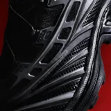Championes Salomon XT-Evo de diseño técnico y deportivo, color gris, con detalles superpuestos y suela de gran tracción ideal para running y trekking.