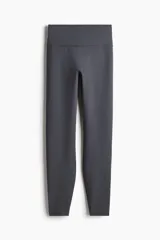 Leggings deportivos de tiro alto con cintura ancha, confeccionados en tejido funcional gris oscuro con tecnología SoftMove y DryMove.