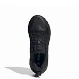 Championes de running Adidas modelo Ultrarun 5 TR, color negro. Presentan un diseño técnico con malla superior repelente al agua, mediasuela con tecnología Bounce 2.0 para mayor amortiguación y suela de goma Adiwear con taqueado para un agarre óptimo en diversas superficies.