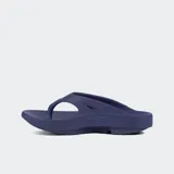 Sandalias tipo ojota de recuperación OOFOS, color negro, con diseño ergonómico de plataforma y tecnología OOfoam para mayor absorción de impacto y soporte del arco plantar.