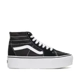 Championes Vans modelo Sk8-Hi Tapered Stackform de caña alta, con diseño deconstruido y suela de plataforma gruesa. Presentan el icónico lateral con la banda Sidestripe, confeccionados en lona y gamuza con cordones blancos.