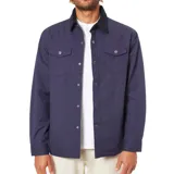 Campera azul con cuello de pana marrón, cierre frontal con botones a presión, dos bolsillos de parche en el pecho y puños abotonados.