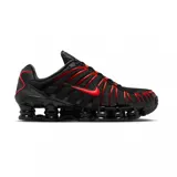 Championes Nike Shox TL con diseño icónico y amortiguación mecánica en color negro con detalles en rojo. Cuenta con capellada de malla transpirable, estructura de TPU y suela de goma.