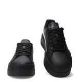 Championes urbanos Puma Karmen Classic con plataforma, color negro con la clásica franja lateral en blanco y suela gruesa texturizada.