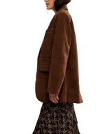 Blazer marrón de corte holgado, con solapas y bolsillos delanteros.
