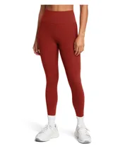 Calza deportiva de tiro alto con bolsillos laterales, confeccionada en tejido elástico de alto rendimiento que absorbe el sudor y ofrece sujeción.